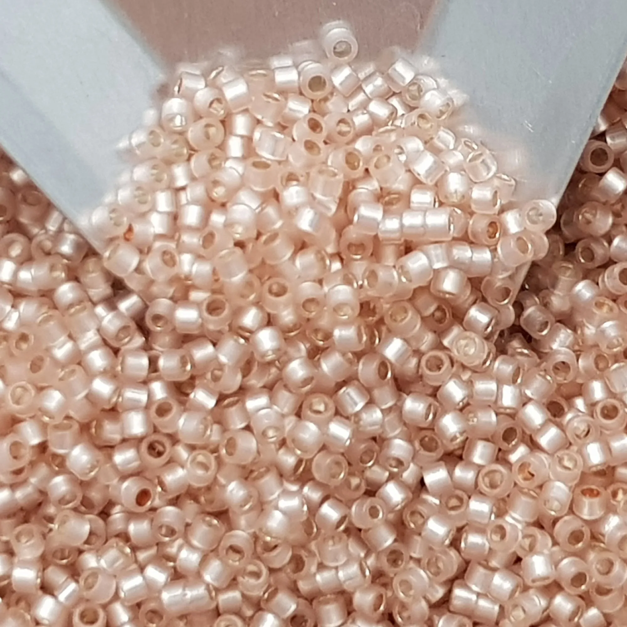 Aiko 11/0 TA-2126 Lt Peach Translucent Silver-Lined Precision-Cut Cylinder Toho Seed Beads | Beading Supply