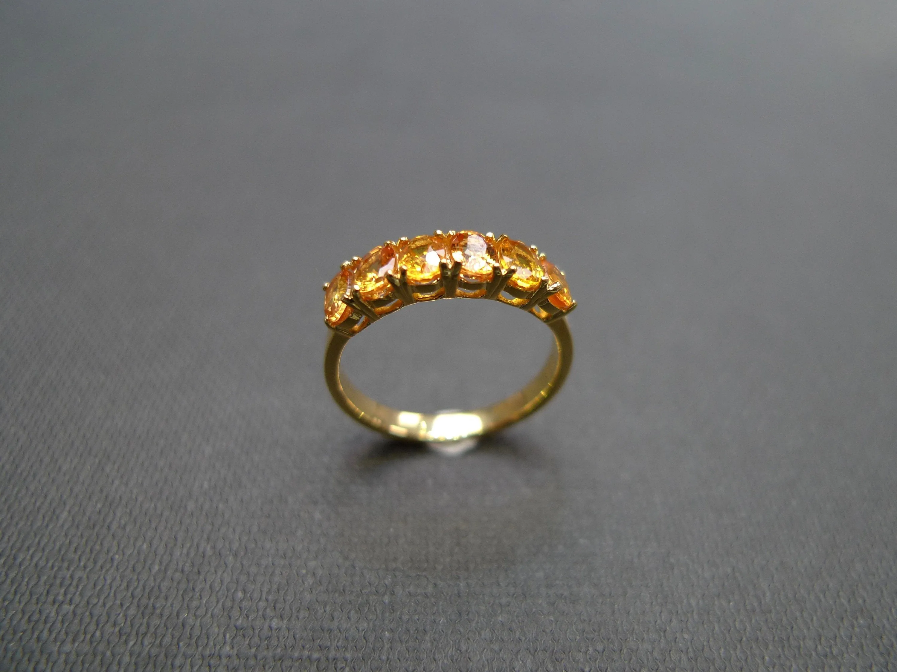 Oval Cut Yellow Sapphire Ring in Yellow Gold