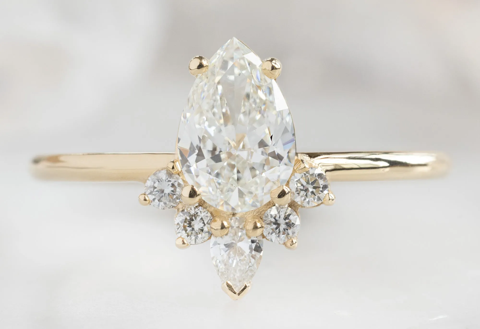 The Aster Ring with a .75ct Pear-Cut White Diamond