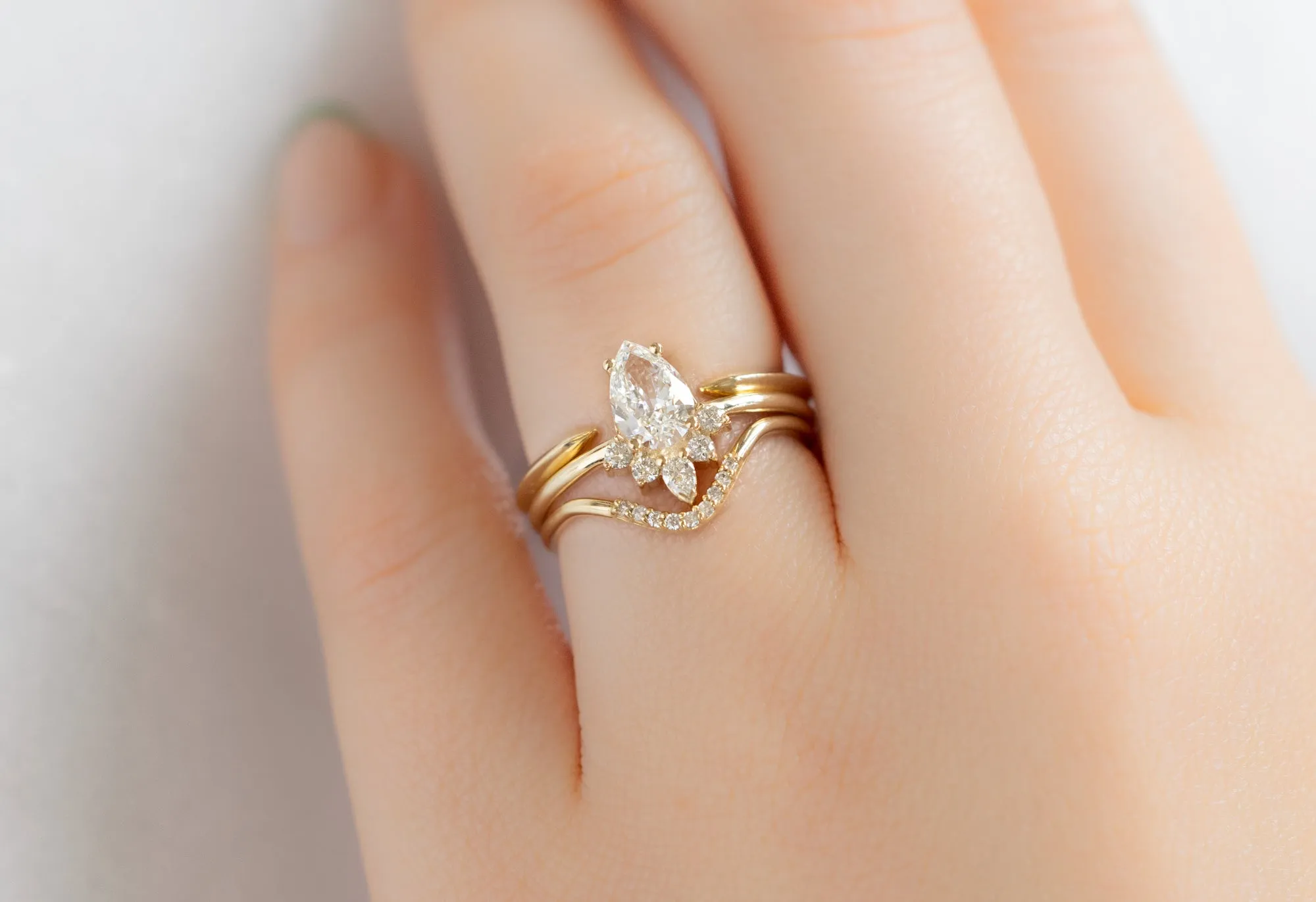 The Aster Ring with a .75ct Pear-Cut White Diamond