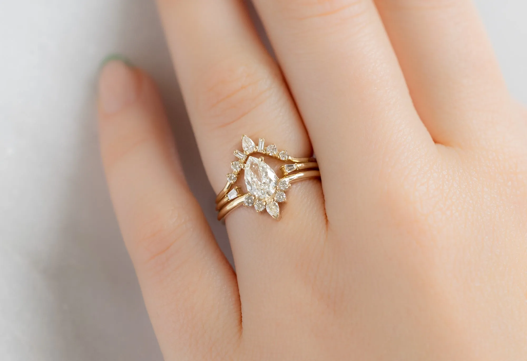 The Aster Ring with a .75ct Pear-Cut White Diamond